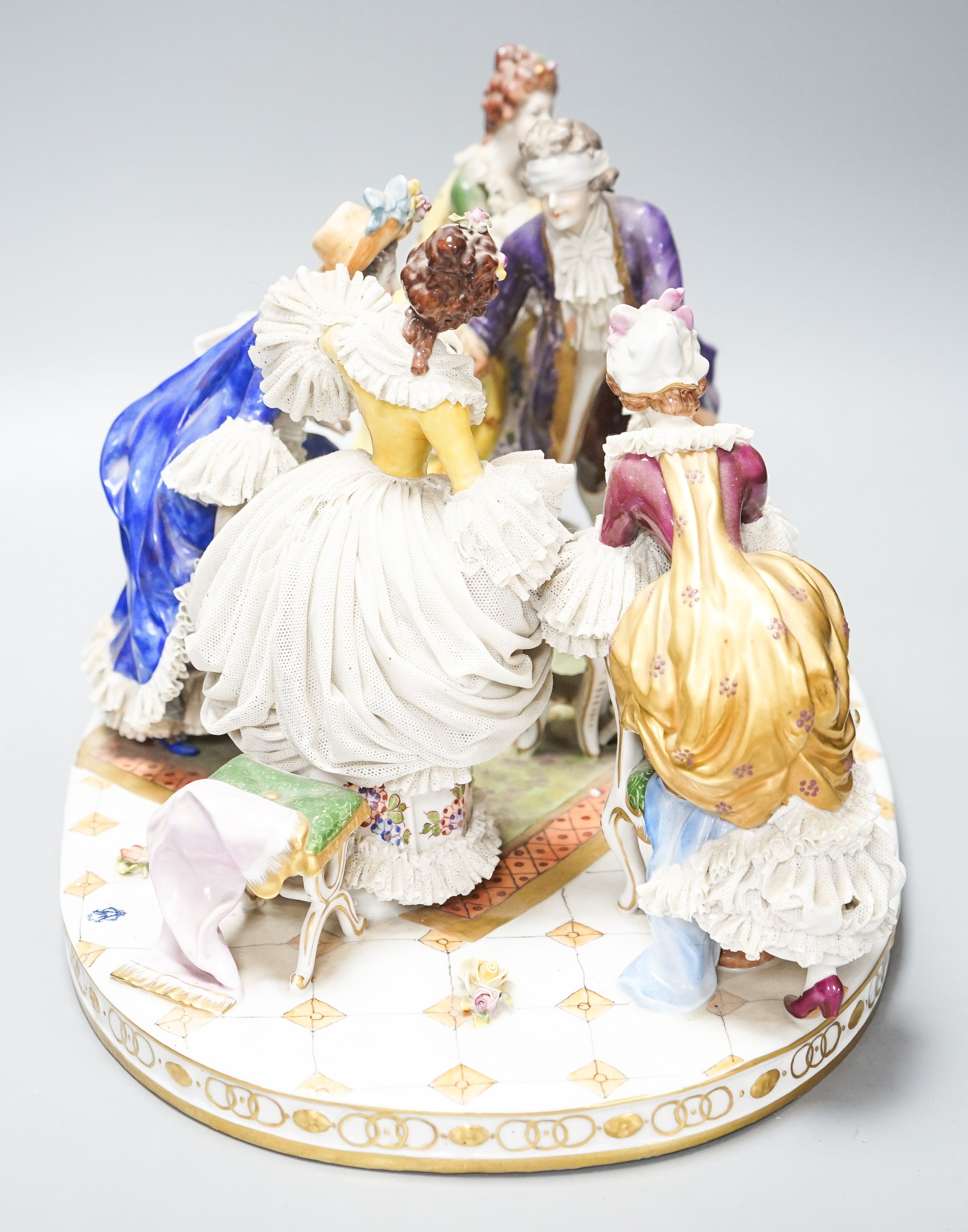 A large German porcelain ‘Blindman’s bluff’ group 46cm